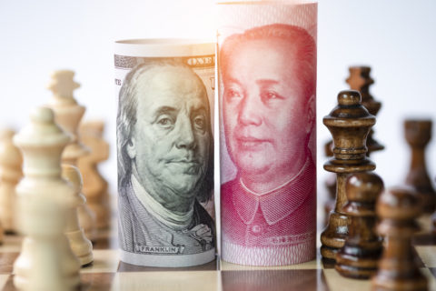 Us Dollar And Yuan Banknote With Chess For Tariff Trade War Betw